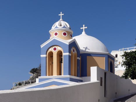 Santorini Cliff Villas With Dome Floors and White Walls