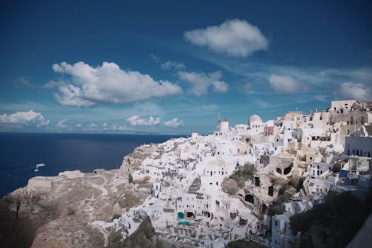 Santorini Dome Villas With Ocean Floors and Infinity Ceilings
